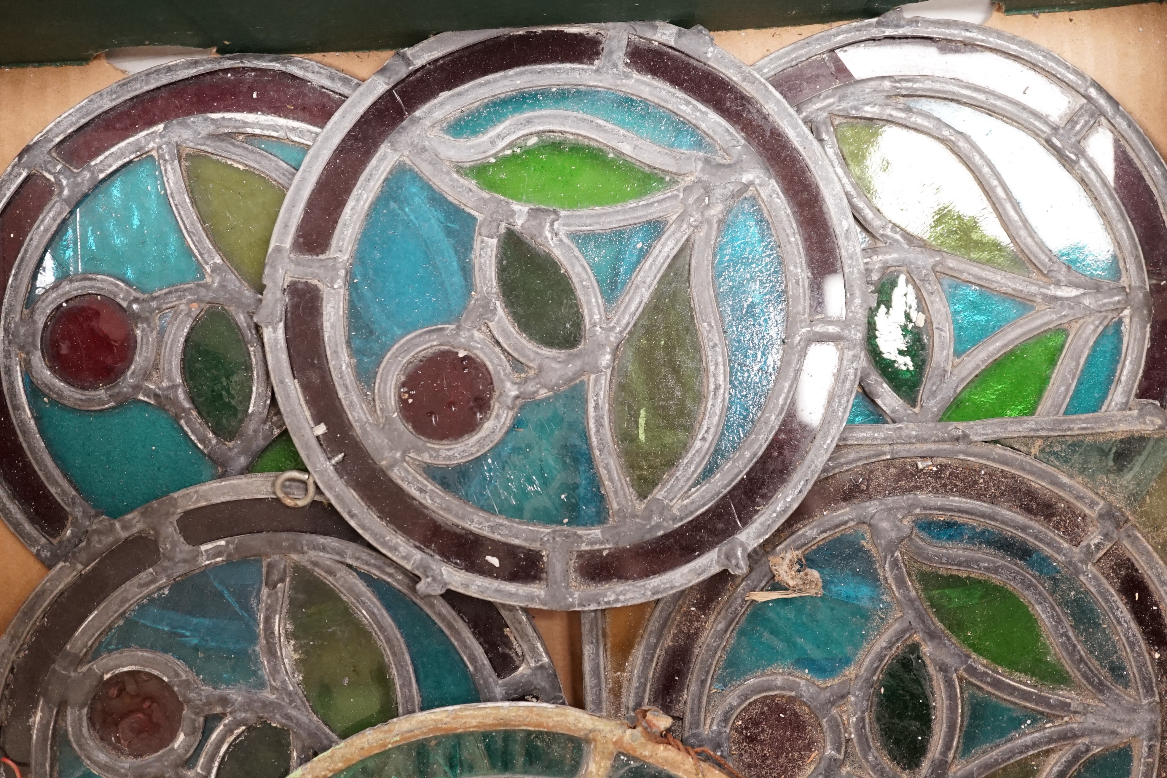 A selection of decorative stained glass panels.